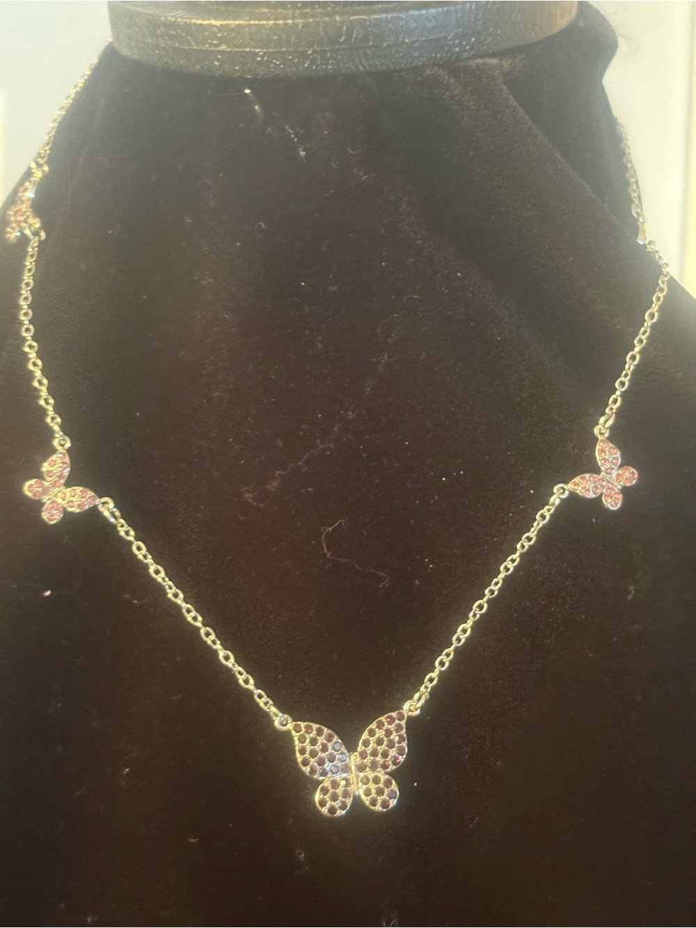 Silver Butterfly Pendant Necklace with cranberry colored Crystals
